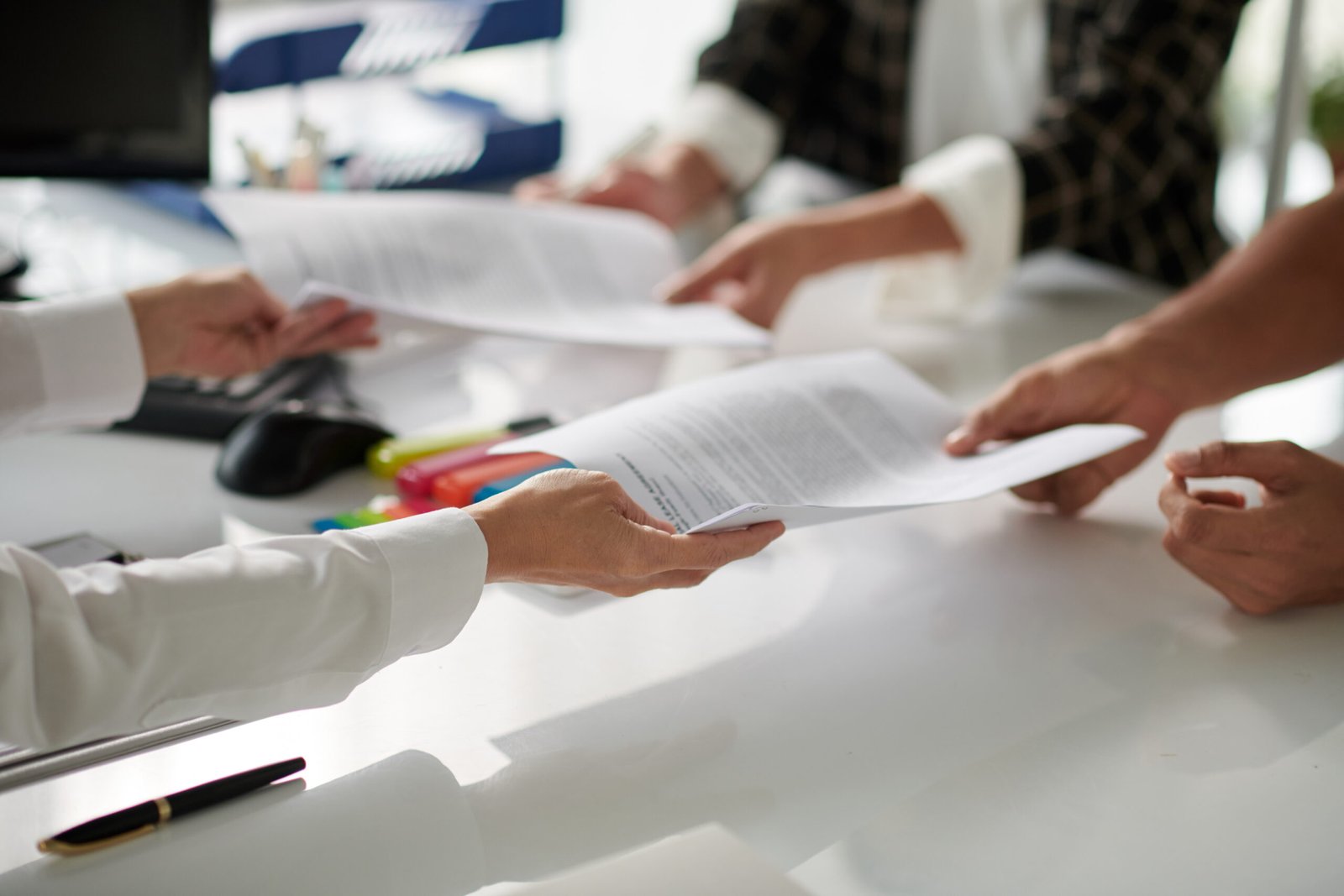 lawyer giving documents
